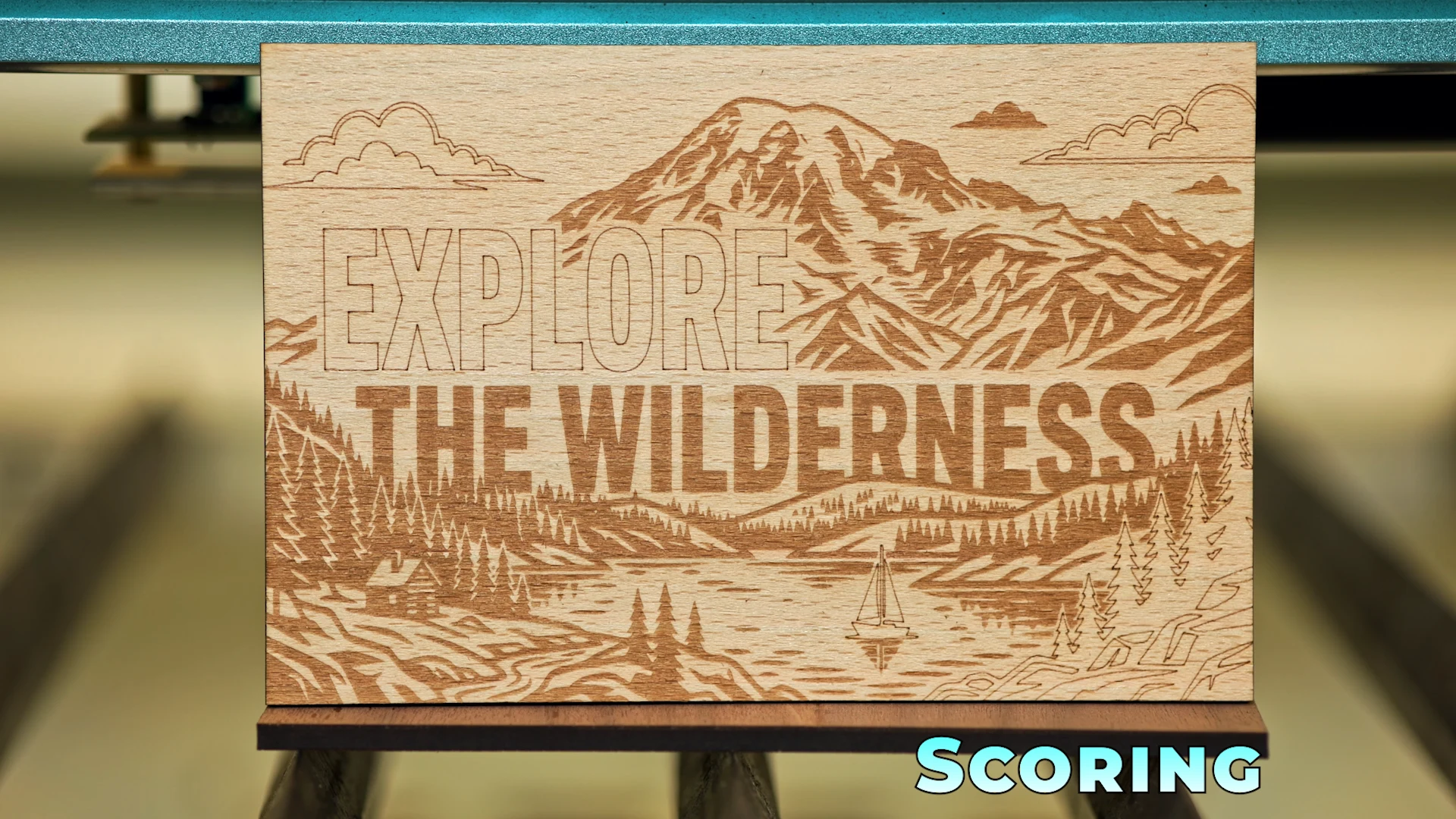 Laser scored wood engraving on veneered MDF showing clean fine lines, minimal burn buildup, sharp detail, and precise vector engraving without filled areas.
