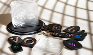 Laser-cut personalised acrylic coasters, name keychains and fridge magnets made with layered acrylic