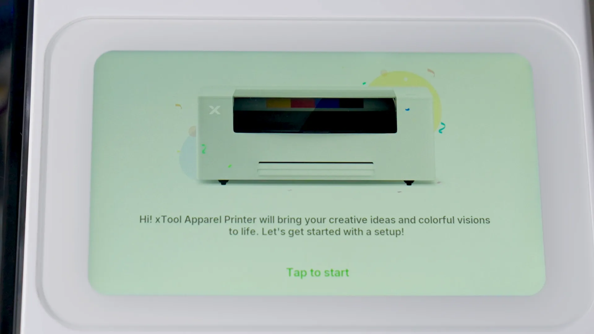 xTool Apparel Printer touchscreen displaying the guided setup start prompt