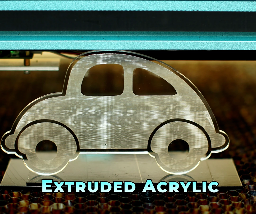 Car design engraved on extruded acrylic with visible uneven frosting and scan lines