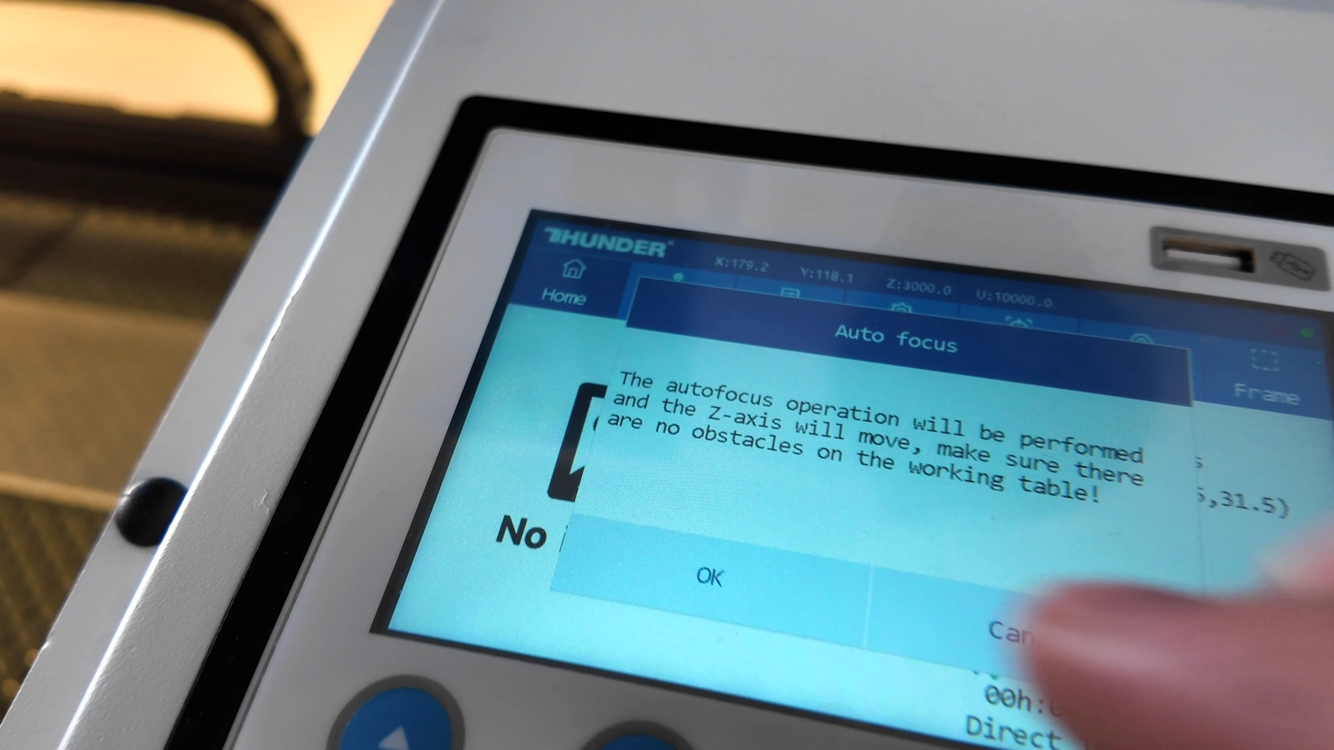 Thunder Bolt laser control screen showing the autofocus confirmation message