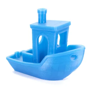 Blue 3D printed Benchy model showing the detail and surface finish of filament 3D printing.