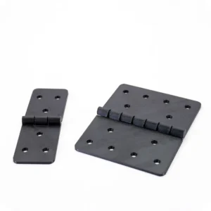 Black 3D printed hinges with integrated joints and mounting holes for functional applications.